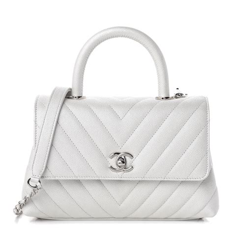 CHANEL Iridescent Caviar Chevron Quilted Mini Coco